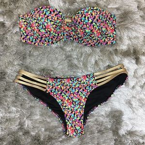 Victoria Secret bikini and a pair of sun glasses